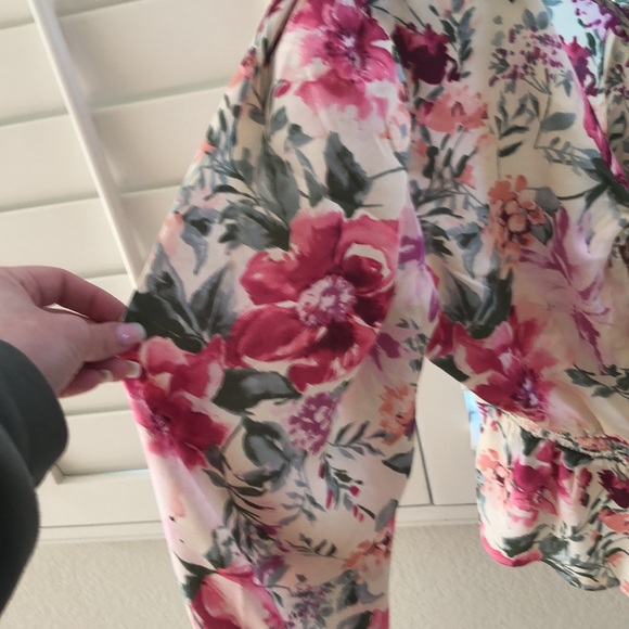 Express floral faux wrap tie back peplum top. - Picture 6 of 6